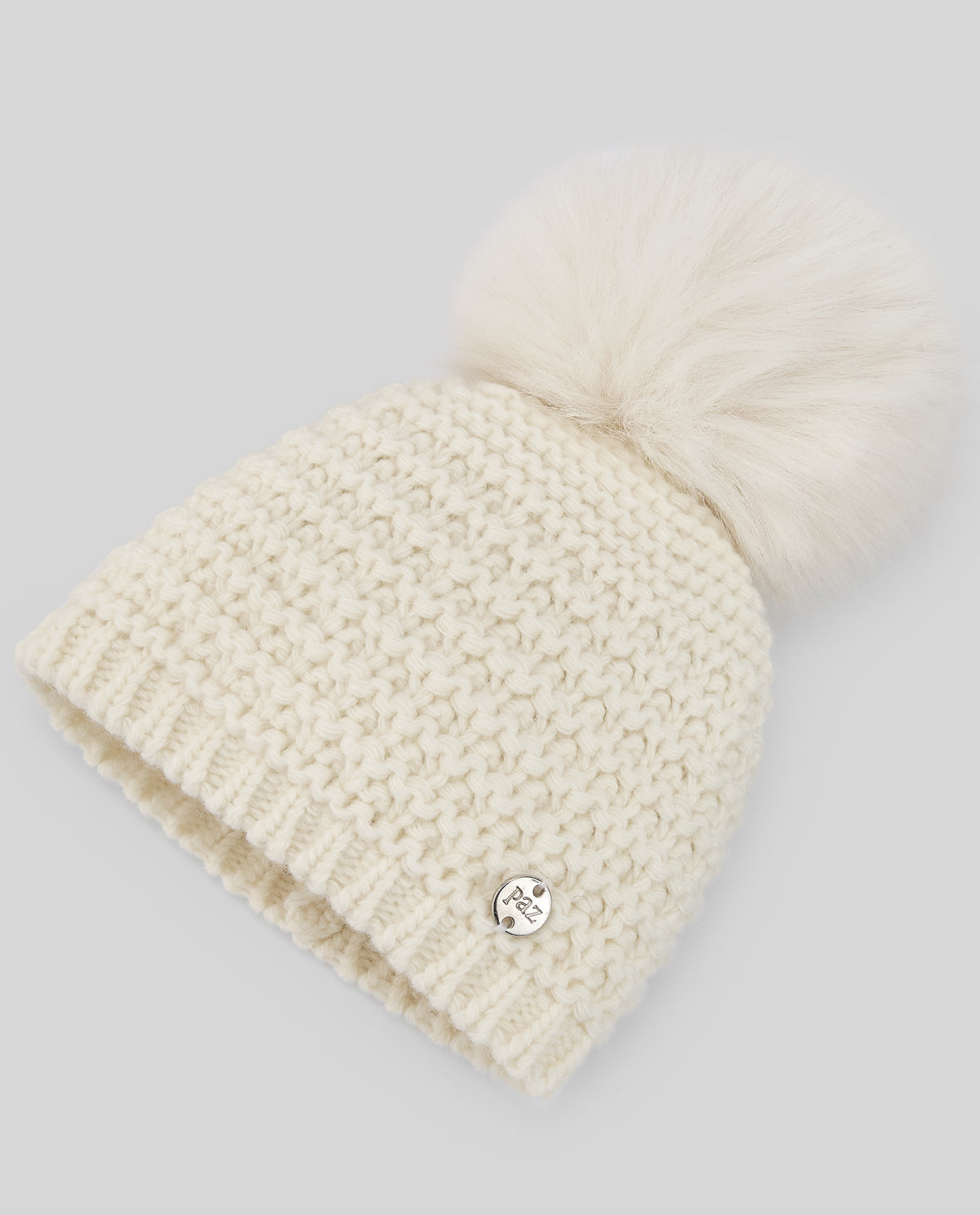 Hat with pompom "ESENCIAL"