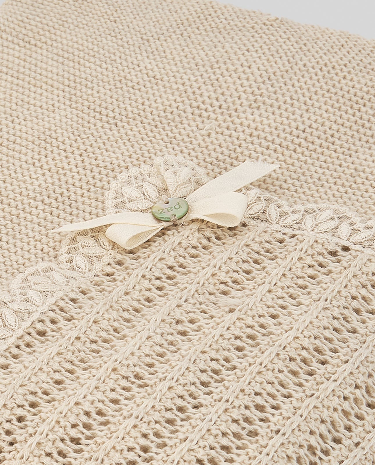 Strick-Einschlagdecke ALEGRIA