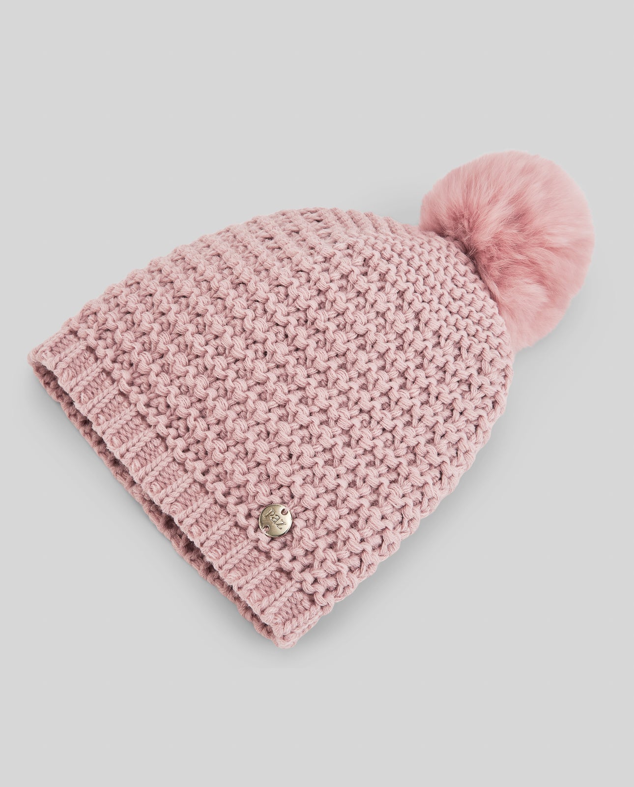 Hat with pompom "ESENCIAL"