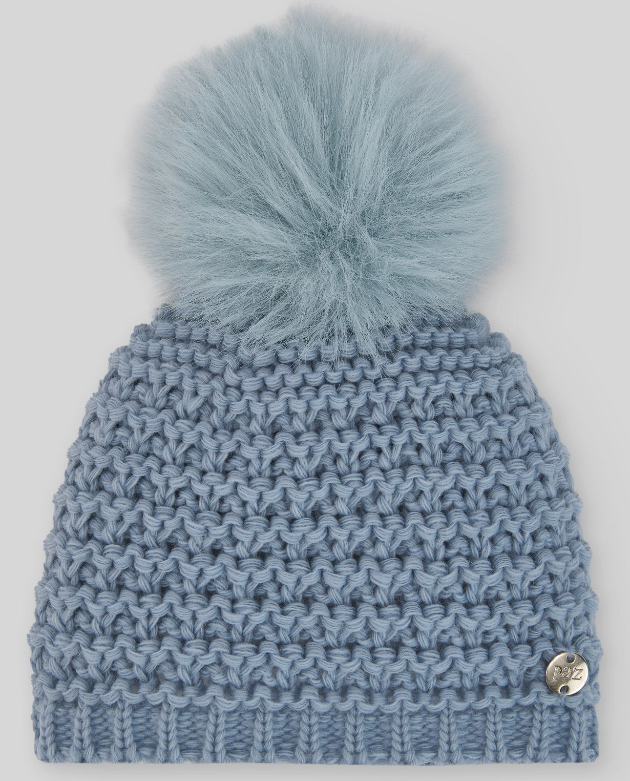 Hat with pompom "ESENCIAL"