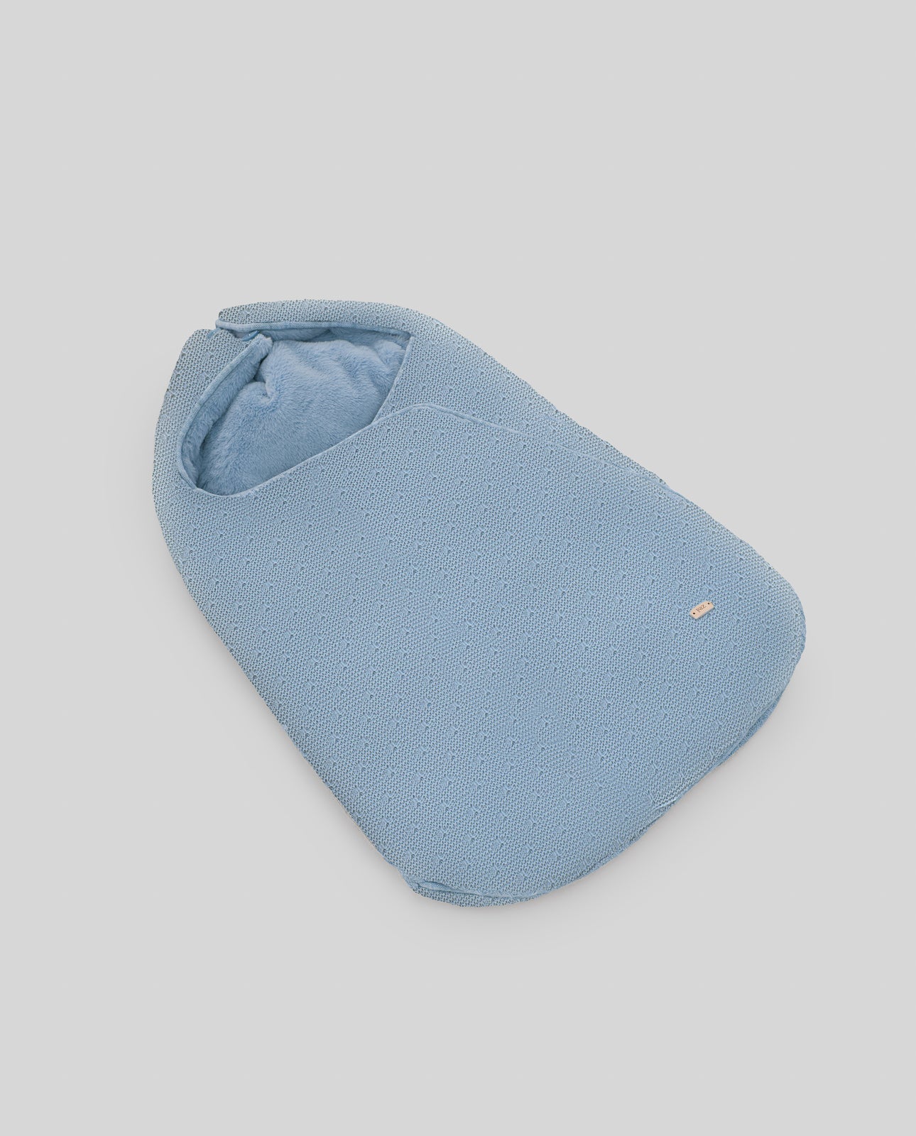 Babywannen-Sack aus Strick und Fell FEITO