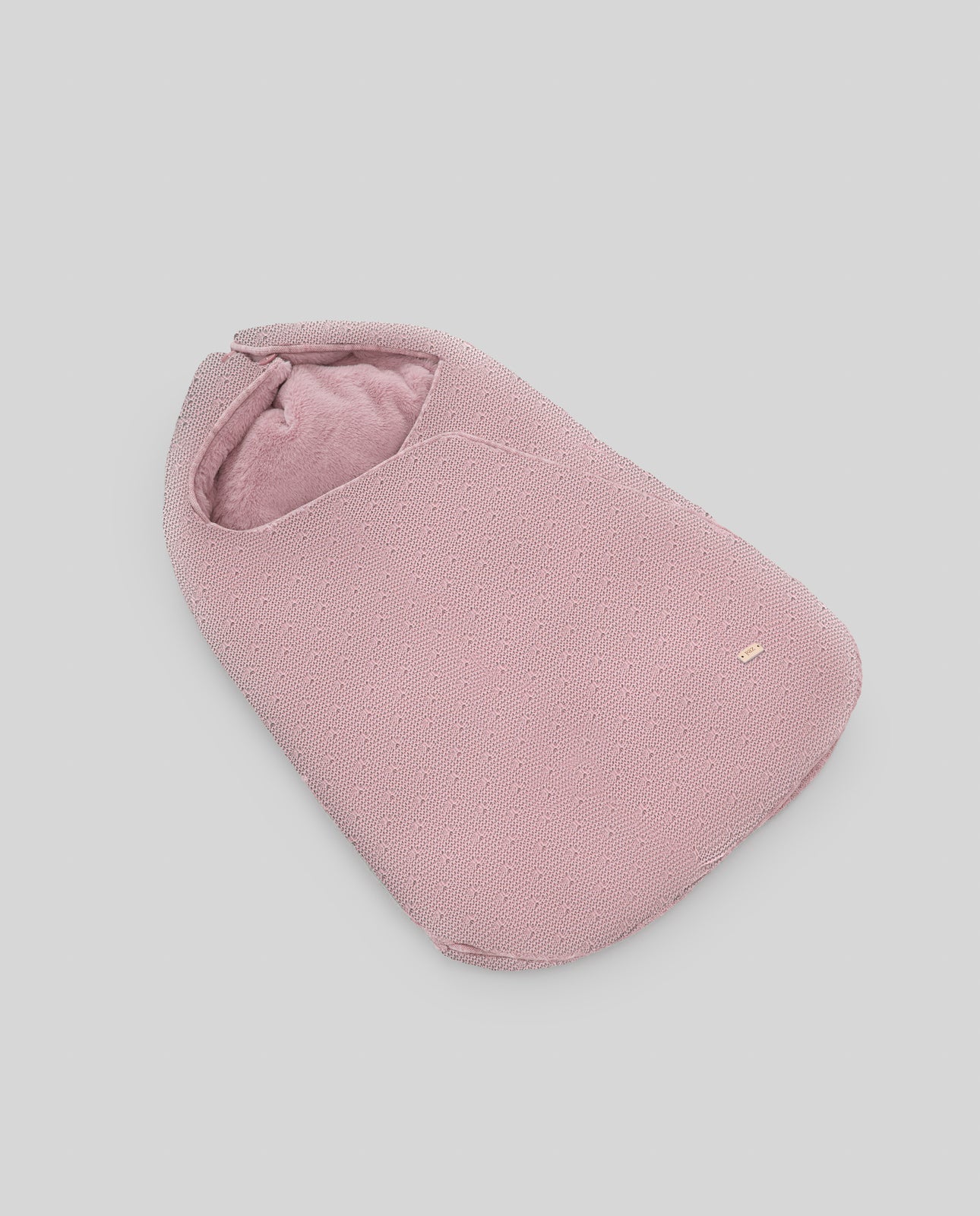 Babywannen-Sack aus Strick und Fell FEITO