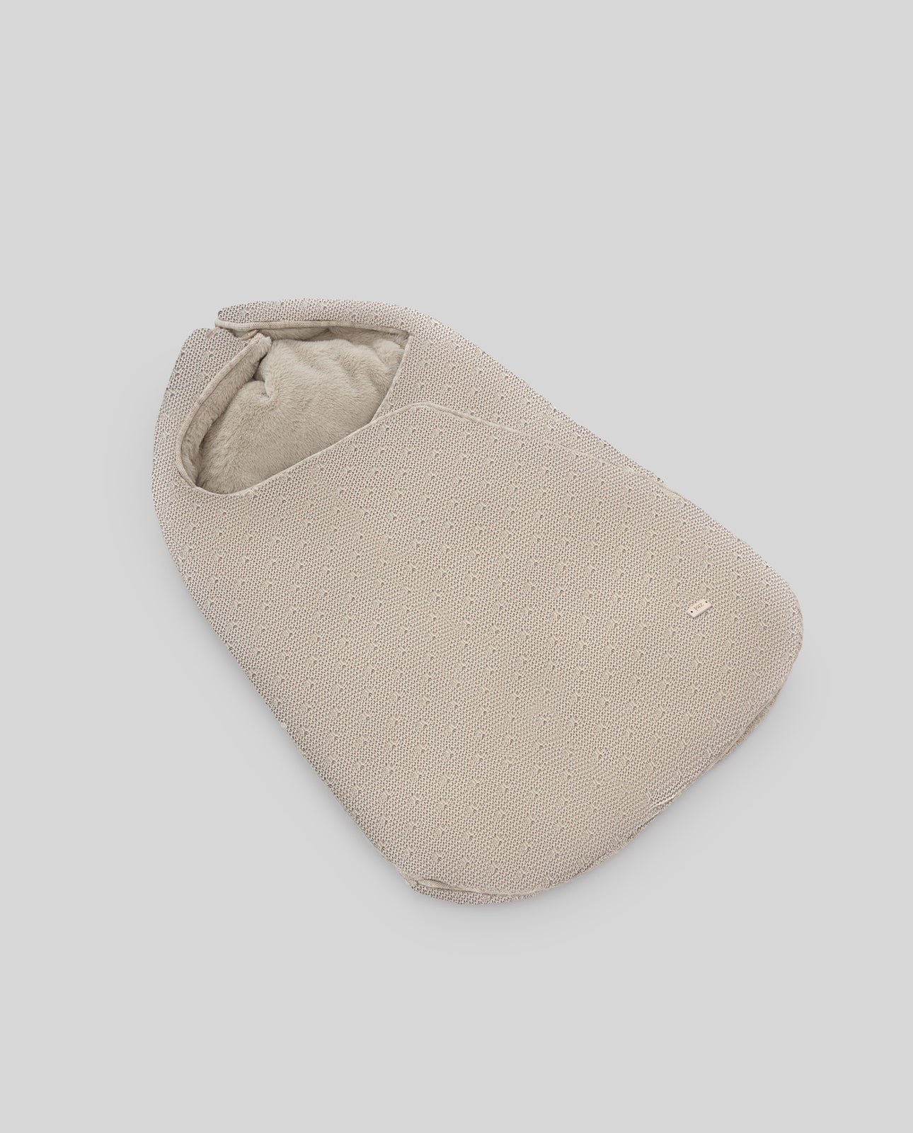 Babywannen-Sack aus Strick und Fell FEITO